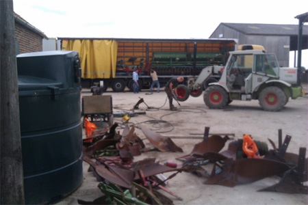 Loading lorry with machinery spares